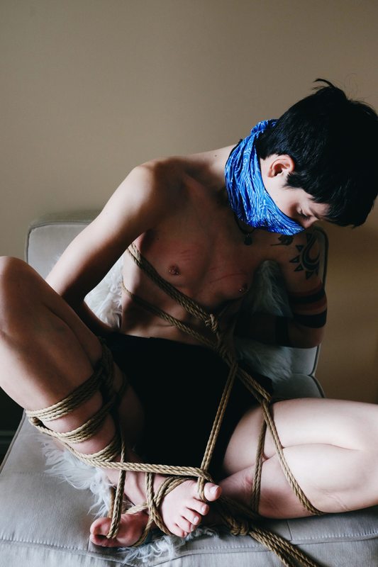 A sexy photograph of Cam Damage. Tagged with: rope, bondage & self portrait.